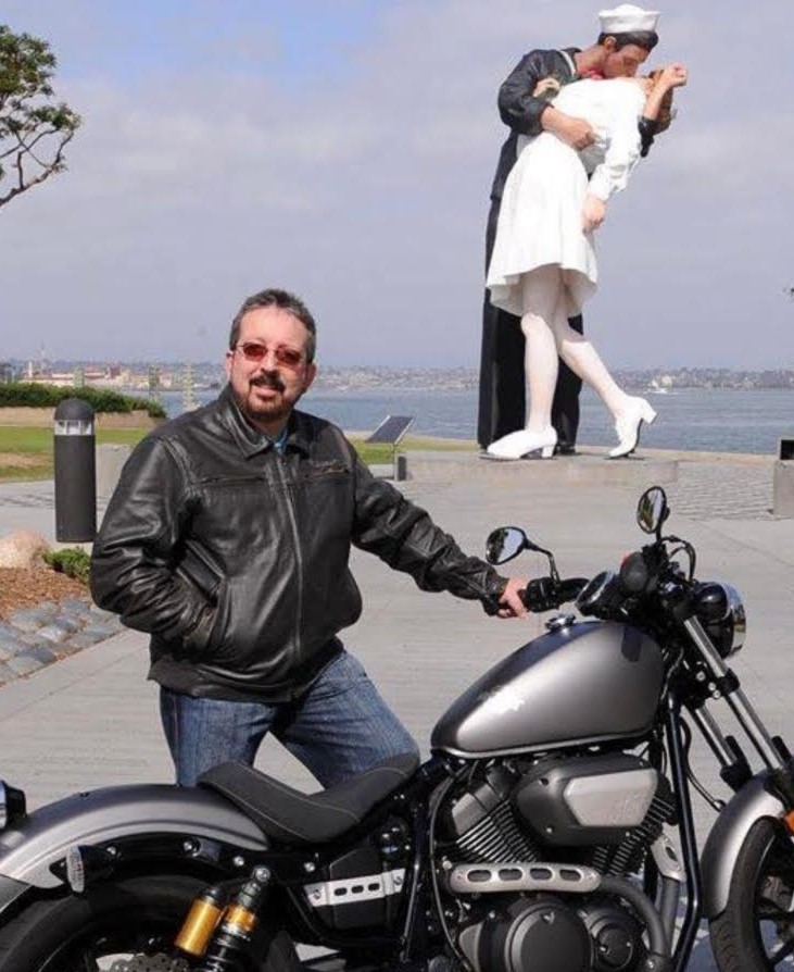 Greg Sanchez with a motorcycle